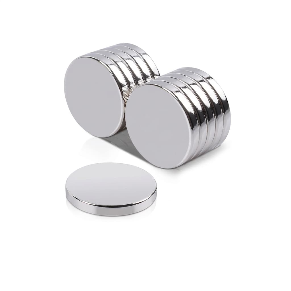 Nickel coated neodymium rare earth disc magnets stacked beside a single flat disc